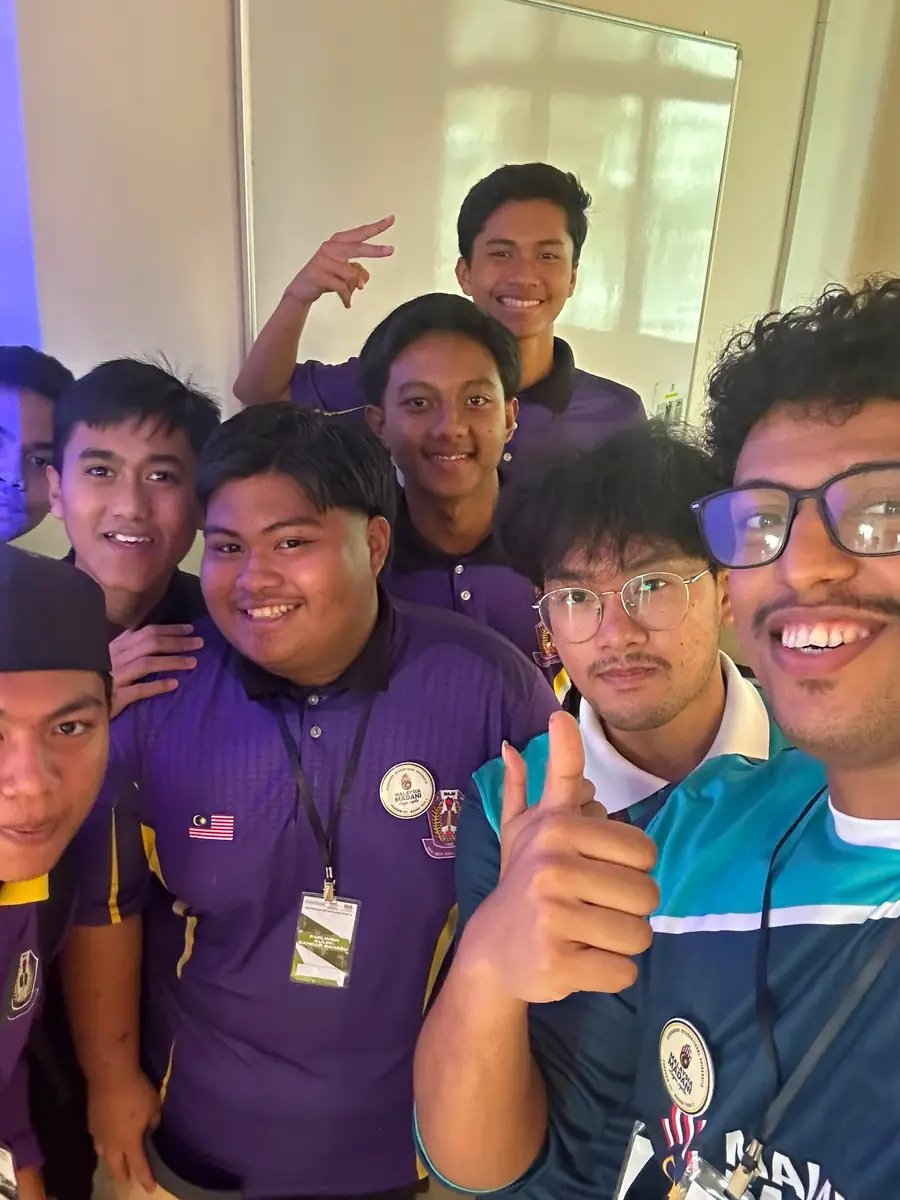 A group photograph with members of the tech club.